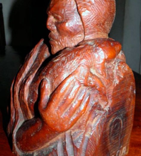 Viejo pastor con oveja